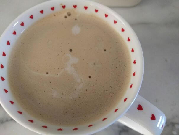 20 Pictures Prove That 'Accidental' Art Can Be Astonishing - After I Poured Milk Into My Coffee, I Found Snoopy On The Doghouse Under The Moon
