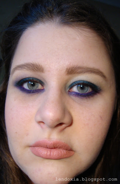 purple and turquoise eye make up