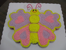 Pastel mariposa formado por cucpakes