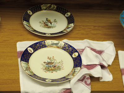 Preparing the tableware for a state banquet in a Royal Welcome  2015 exhibition at Buckingham Palace  Photo © Andrew Knowles