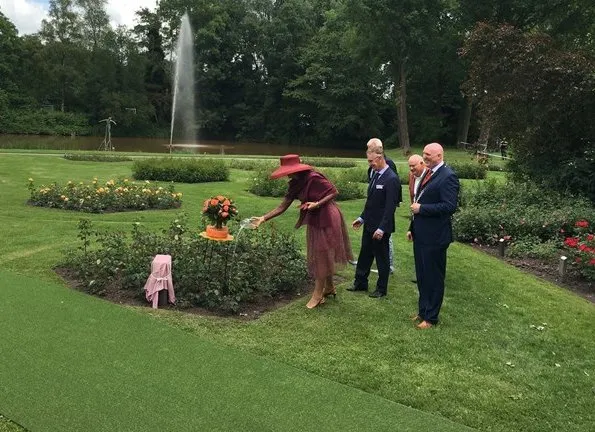 Queen Maxima presents a new rose during the Dutch Rose Association's National Symposium at the Rosarium in Winschoten