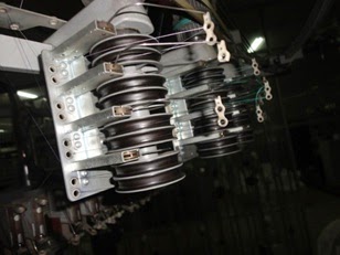 Negative feed device