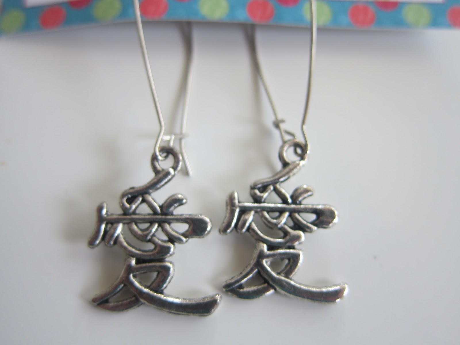 The Tales of Two Item 61 Love Chinese symbol earrings2nd set
