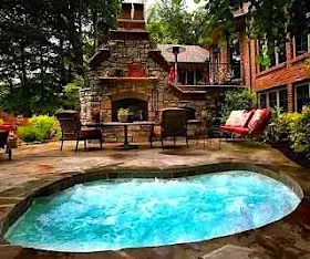 Backyard retreat with nice swimming pool.