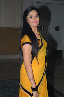 Sri Mukhi Glamorous Photos in Yellow Saree HeyAndhra