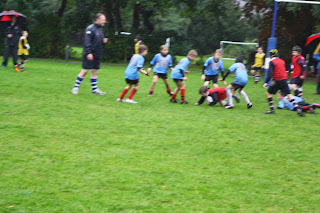 Rugby-boys-son-rain-weather