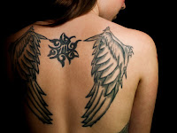 Feather Tattoo On Shoulder Blade