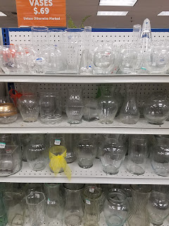 goodwill vases on shelves