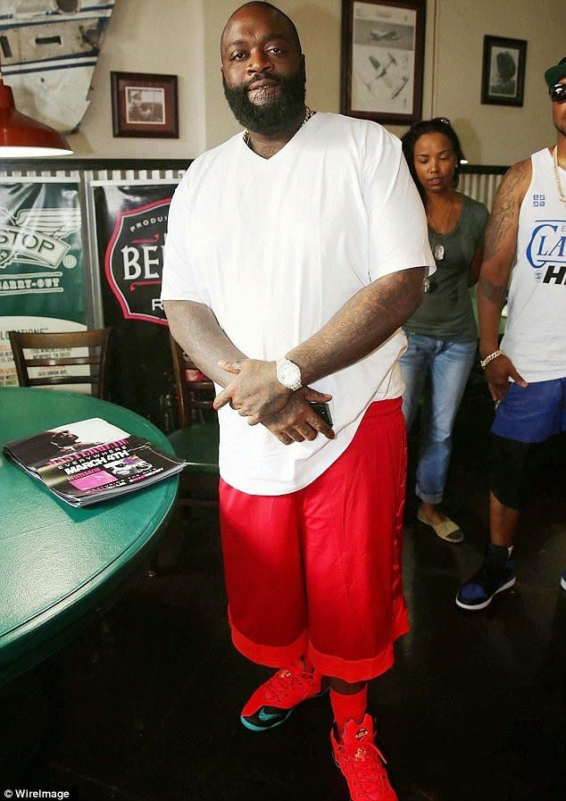 WOW SEE Rick Ross Tattoos 'Rich Forever' On His Chin COOLEST INFO