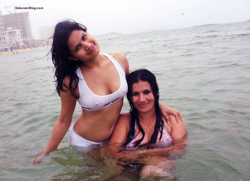 Indian Campuss Busty NRI Aunty With Girl Showing Cleavage And Wet Tits Pokie In Swimwear Pics
