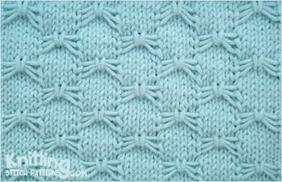 Use knit, purl stitches and slip stitch with yarn in front to create a butterfly bowknot pattern.