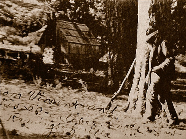 Tom Vincent aka Dougherty, founder of Big Horn Mine near his cabin in the late 1880's. Tom Vincent and his 50 caliber Remington hunting rifle near his cabin, late 1800's.