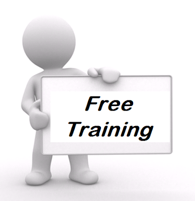 A man is holding a sign which says free training.
