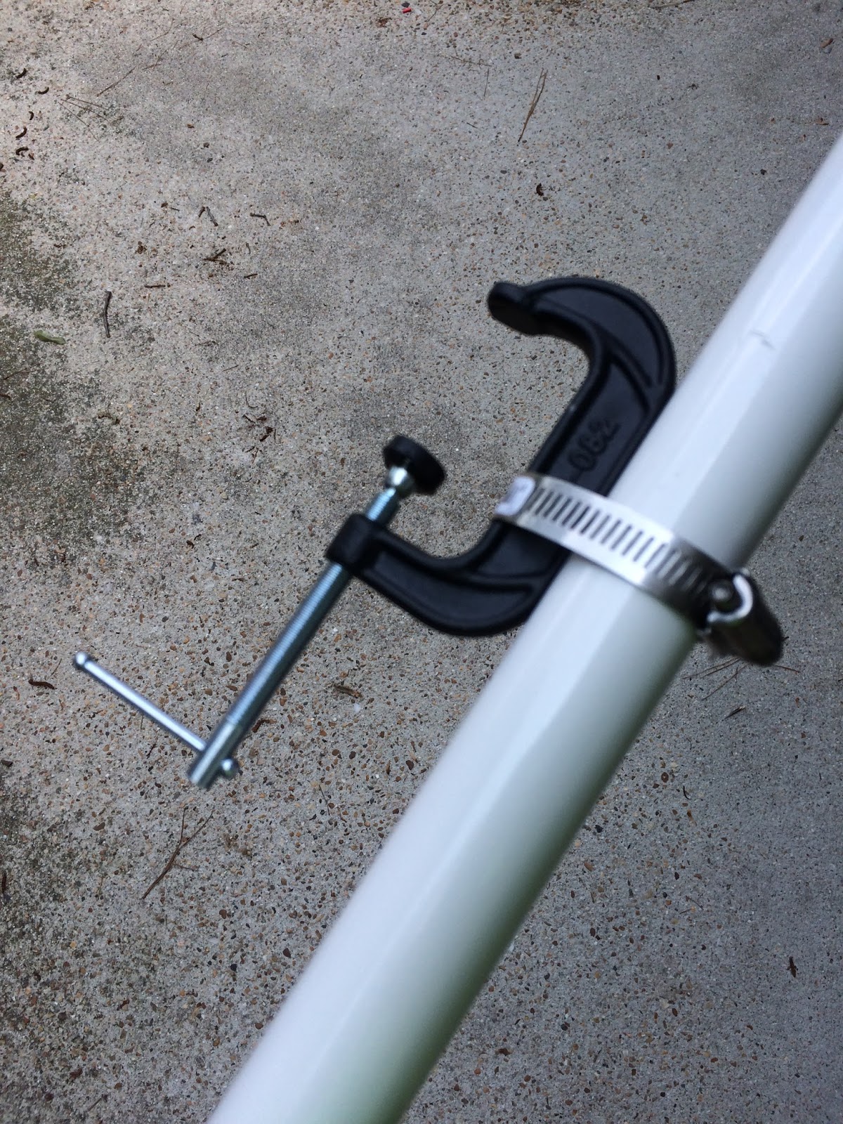 Securing a Market Umbrella at an Outdoor Craft Show