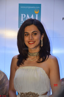 Tapsee Pannu looks Beautiful in White Sleeveless Gown Exclusive  Pics 03