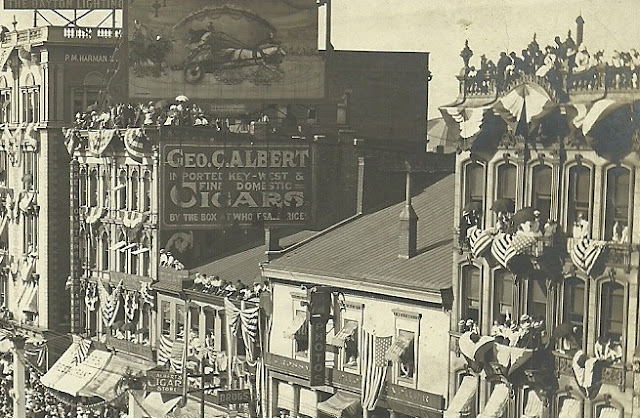 People on rooftops watching the June 18th Wright Brother Home Celebration parade. From Matt Yanney collection