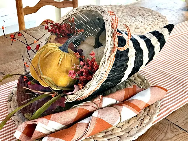 DIY pumpkin filled striped cornucopia for Thanksgiving. Homeroad.net