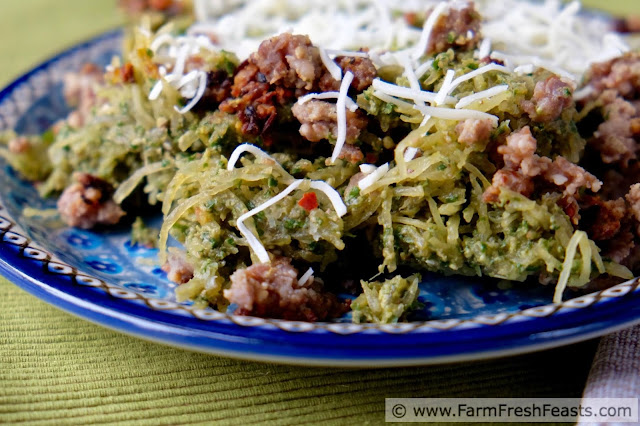 A low carb entree of baked spaghetti squash tossed with mustard greens pesto. Jazz it up with crumbled Italian sausage and cheese for a farm share dinner to please the while family.