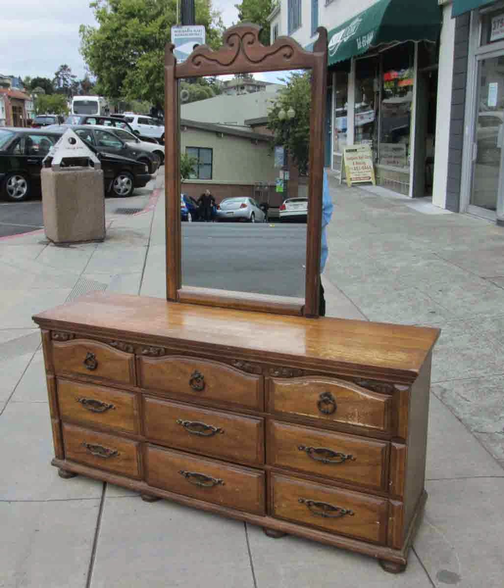 UHURU FURNITURE & COLLECTIBLES: SOLD 9-Drawer Dresser with Mirror - $40