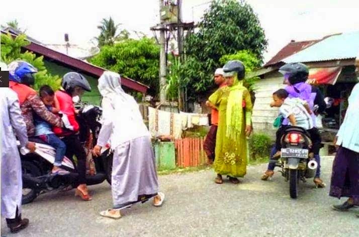 DISEMBUR CAT JIKA LELAKI ATAU WANITA ISLAM BERPAKAIAN