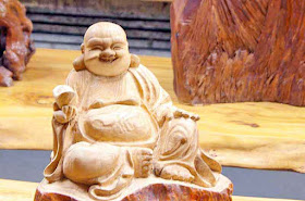 Buddha, statue, wooden table