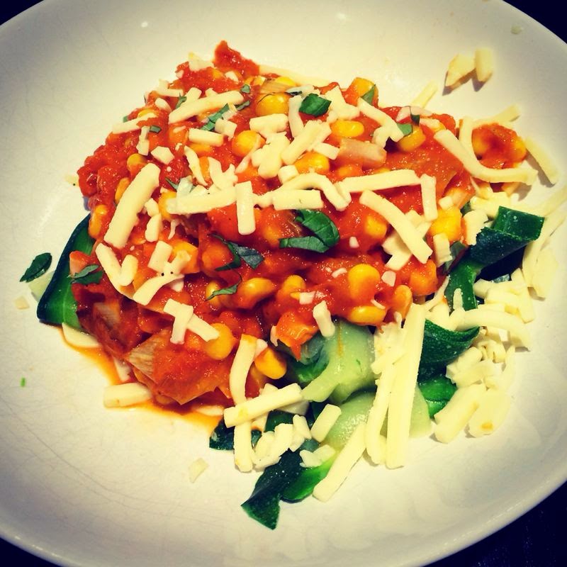 Feeding Issy Red Pepper Sauce with Courgette Pasta