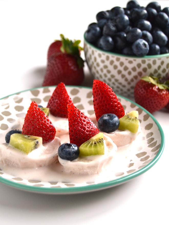 Make your own ice cream cake at home with this easy, homemade strawberry sweet cream ice cream topped with fresh fruit for the perfect celebration! www.nutritionistreviews.com