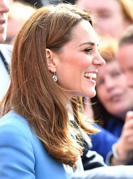 Kate Middleton wore a cornflower blue coat by Alexander McQueen. Emmy London Josie shoes Mappin and Webb empress drop earrings