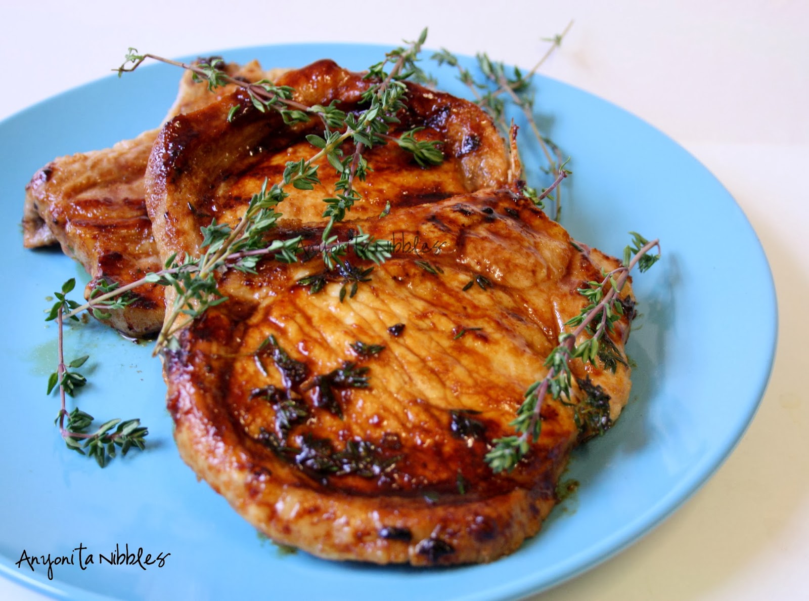 A plate of honeyed thyme pork chops from www.anyonita-nibbles.co.uk