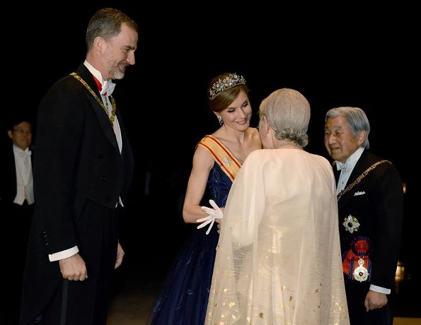 King Felipe VI and Queen Letizia attend the state banquet hosted by Japanese Emperor Akihito and Empress Michiko at the Imperial Palace. Letiza wore a navy blue gown and diamond tiara