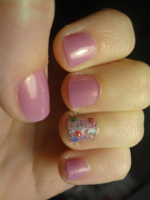 orchid nail polish with lollipop accent nail