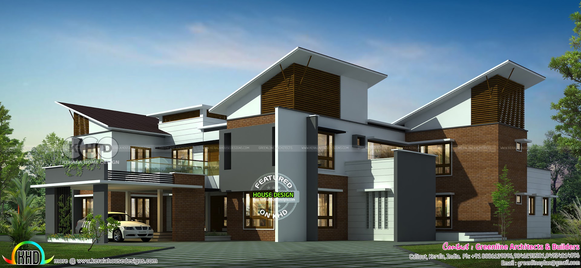 Luxury slanting roof mix 5 bedroom residence Kerala Home Design and