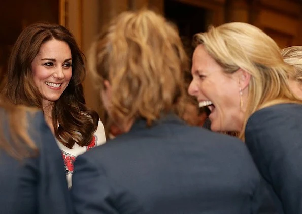 Queen Elizabeth, Prince William, Catherine, Duchess of Cambridge, Prince Harry, Princess Anne and Prince Edward. Kate Middleton wore Alexander McQueen Silk Floral Midi Dress 