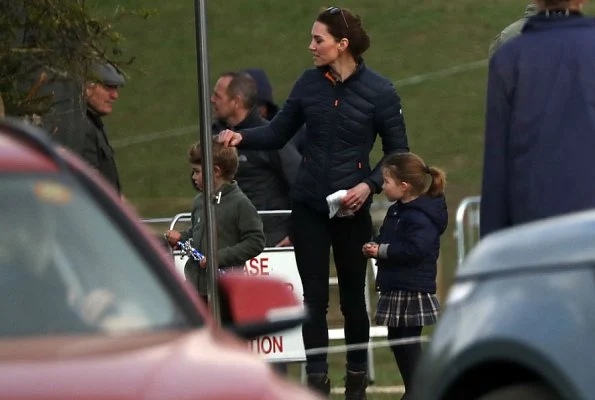 Princess Charlotte. Prince George wore Columbia fleece jacket, Kate Middleton wore Barbour longshore quilted jacket