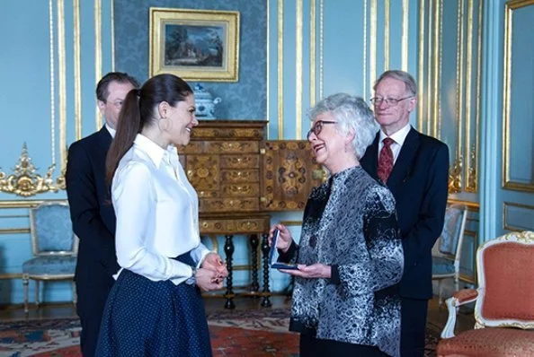 Princess Victoria wore H&M patterned floral skirt. Crown Princess Victoria presented Vega Medal. Professor Gillian Hart and Professor Arild Holt-Jensen