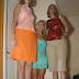 Very tall girl with bigger women :