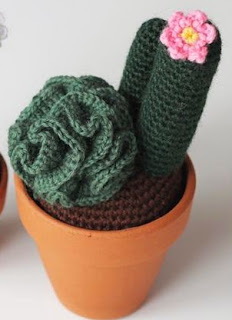 http://www.craftsy.com/pattern/crocheting/home-decor/curly-cactus-english/57612