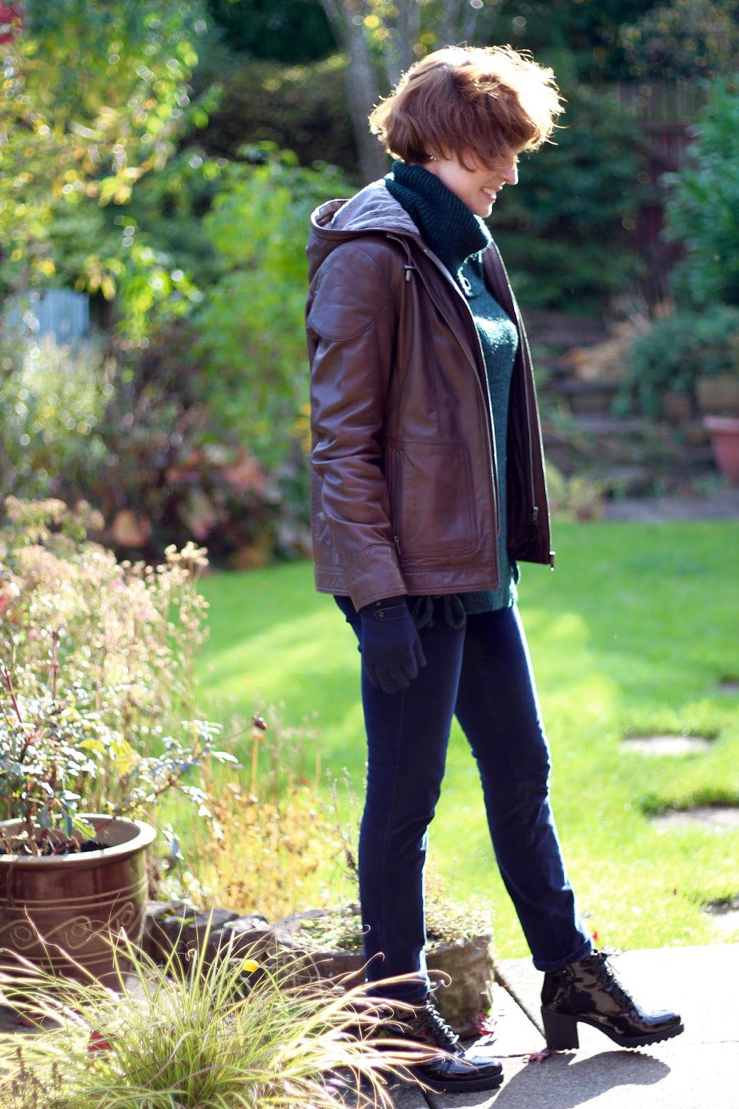 Fake Fabulous | Wearing leather over 40 | Brown jacket, velvet jeans, patent boots & eyelet jumper.