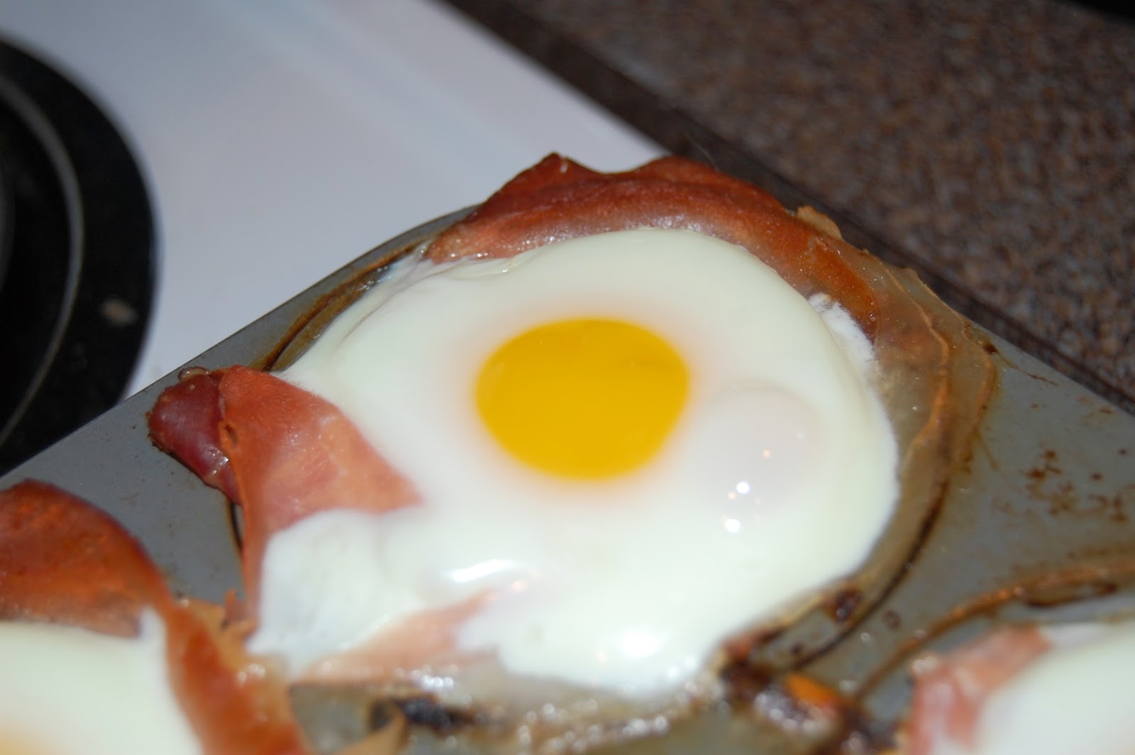 Kitchen Curiosities and more... Baked Eggs in ProsciuttoHash Brown Cups