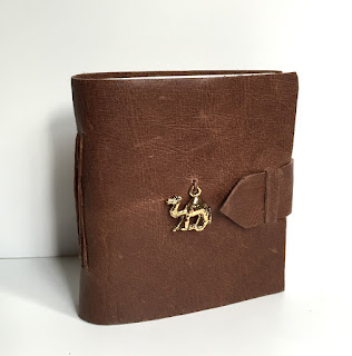 https://www.etsy.com/listing/245408352/brown-leather-mini-journal-with-camel?ref=listing-shop-header-3