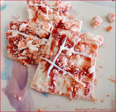 Valentine Bark, a sweet treat with white chocolate and strawberry flavors. Share the love. | Recipe developed by www.BakingInATornado.com | #recipe #ValentinesDay