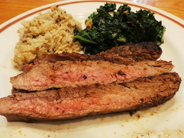 Flank Steak on a plate with rice and kale