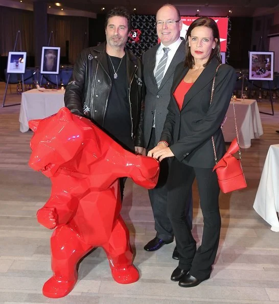 Princess Stephanie, Prince Albert, Camille Gottlieb and Louis Ducruet. Stephanie wore Chanel pantsuit and red top