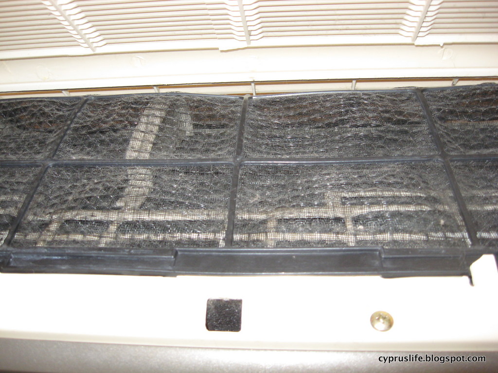 This is Cyprus... Cleaning our air conditioning units (in Cyprus)