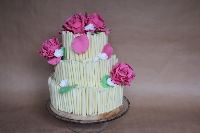 Wedding cake with white chocolate cigars