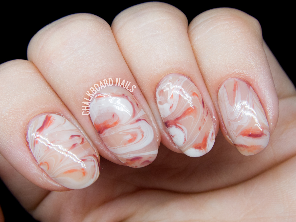 Peachy marbled stone nail art by @chalkboardnails