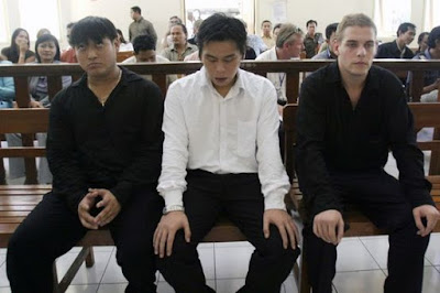 Tan Duc Thanh Nguyen, Si Yi Chen and Matthew Norman in Denpasar District Court. 