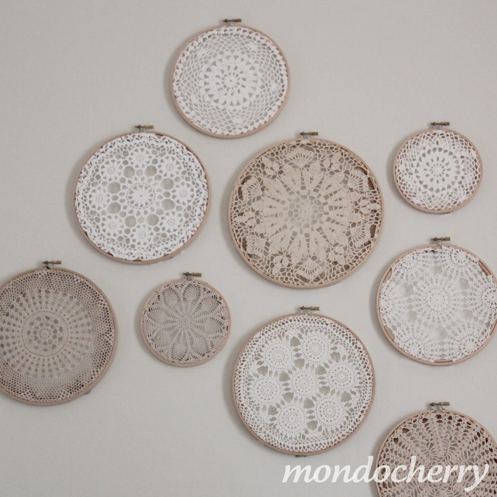 A small bite of mondocherry: embroidery hoops + doilies = art...