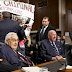 Pacifistas en el Capitolio exigen arresto de Henry Kissinger