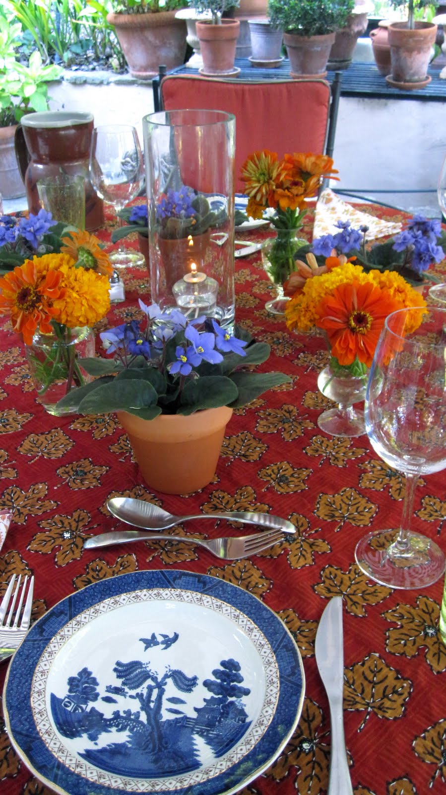 Joe Ruggiero Designer/ HGTV Host Indian Themed Dinner With Bright Table Setting.